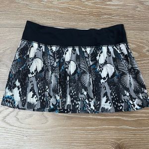 Lululemon tennis skirt- size 6 with black waist band- butterfly print